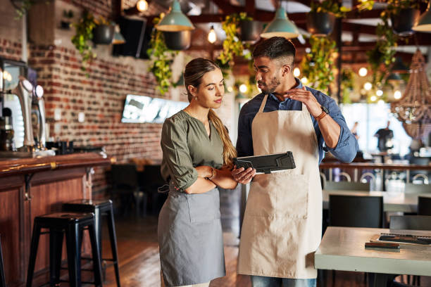 istock Tablet, waiter or business people collaboration for networking, communication or online order check. Research, planning or teamwork for inventory checklist, stock management or social media review 1464788085