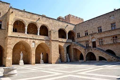 square of medieval castle the Grand Master with arches and monuments on Rhodes island, no people