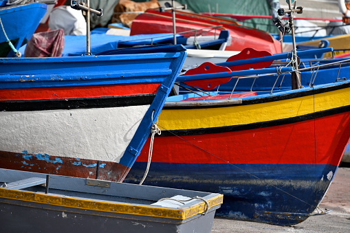 Colorful fishing boats at fisherman village Camara de Lobos in Madeira island