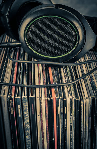 istock Vinyl records and headphones in retro and rustic style 1464796908