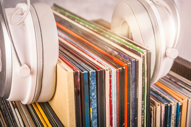 istock Vinyl records and headphones in retro and rustic style 1464796913