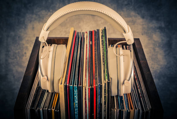 istock Vinyl records and headphones in retro and rustic style 1464796916