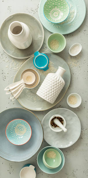 istock Kitchen - ceramic, pastel coloured dishes. Kitchenware from above - vertical banner background. 1464797820