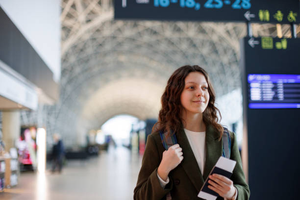 istock Young woman at airport 1464801140