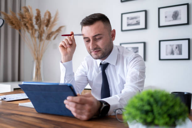 istock Businessman working from home office 1464803435