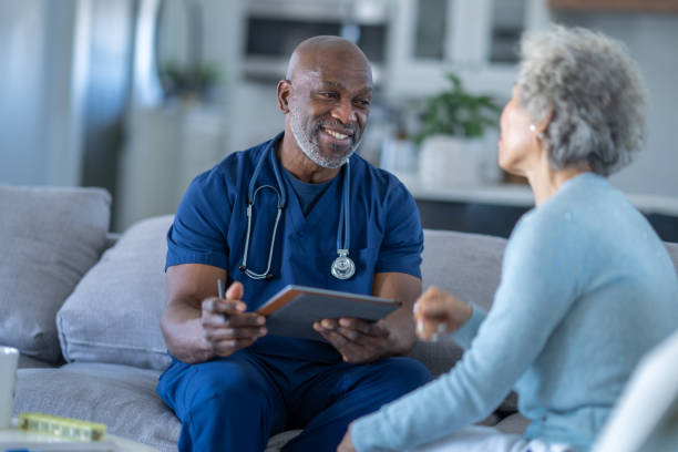 istock Homecare Nurse with a Patient 1464805183