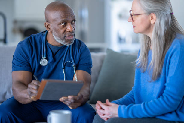 istock Homecare Nurse with a Patient 1464805199