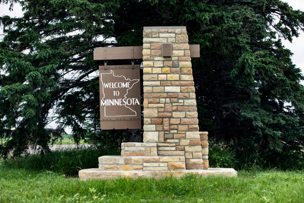 Sign made of brick and wood to welcome people to the state of Minnesota