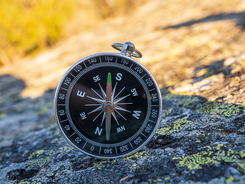 Compass on a rock