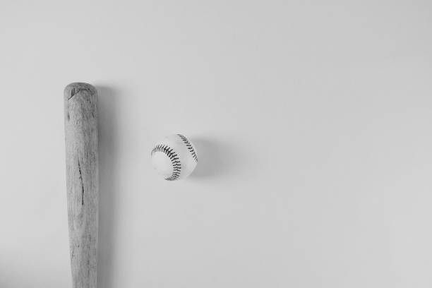 istock Baseball wood bat and ball isolated against background 1464807714