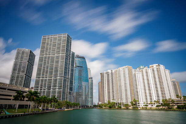 istock Long day exposure highrise skyscrapers Brickell Miami River 1464812934