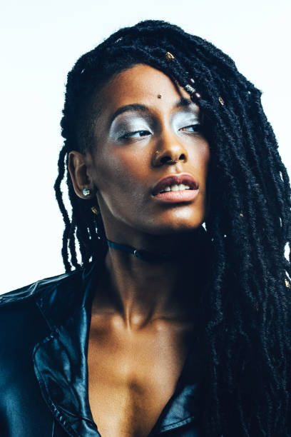 istock modern black woman with dreadlocks looking at copy space 1464814521
