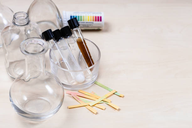 istock test tubes with various liquids, used indicators 1464815655