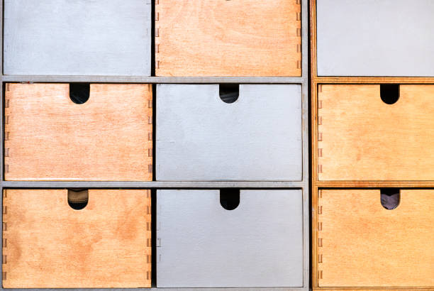 istock closed wooden drawers for small items in rack 1464815802