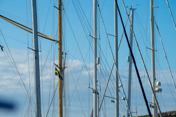 Kungälv, Sweden - July 15 2022: Sailboats in a row at a marina.