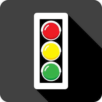 Vector illustration of a traffic light icon in flat style against a black background.