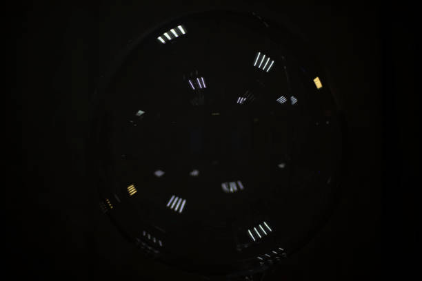 istock Reflection in dark. Ball will reflect lights. Transparent surface on dark background. Rubber material. 1464834679
