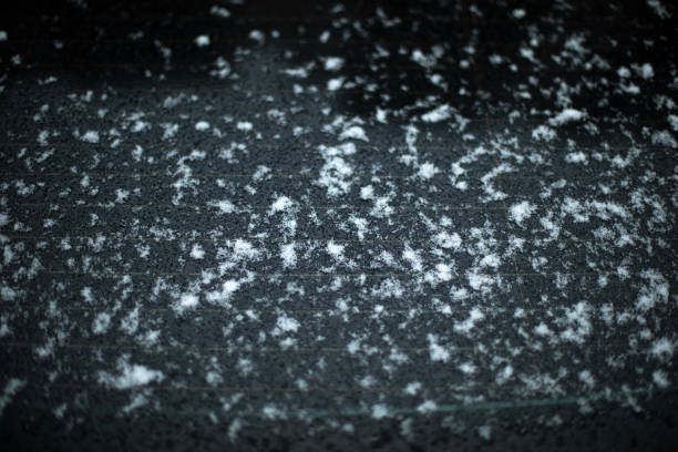 istock Snow by car. Wet machine surface. Transport details. 1464836487