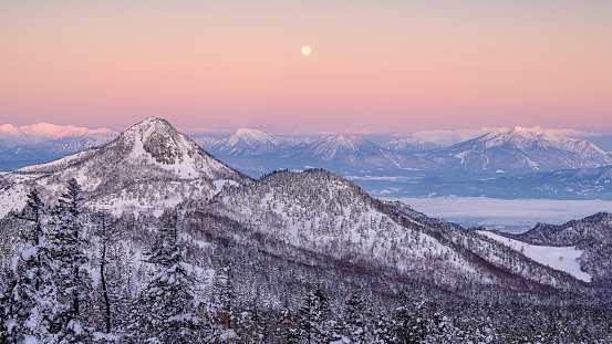 This is a winter daybreak scenery from Mt. Yokote in Nagano prefecture, Japan.\nMt. Yokote is located in Shiga highland, it is well known as a tourist destination for its amazing skiing resort in Japan.\nBut also its landscape is very beautiful and many photographer come and take photos every season.