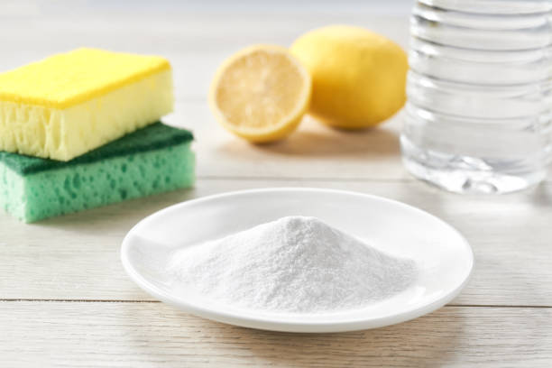 istock Environmentally friendly detergent - baking soda on a white wooden table. 1464850327