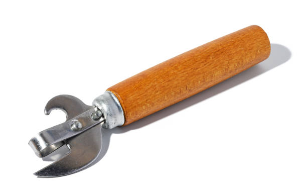 istock Hand opener for cans, bottles with a wooden handle on a white isolated background 1464850334