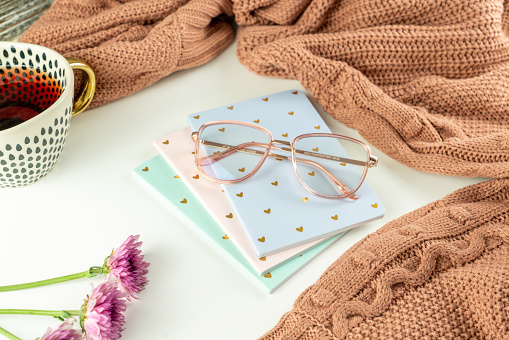 Cozy vibes, flat lay sweater, glasses and tea