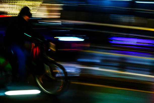 istock CYCLING RIDING IN THE NIGHT 1464855842