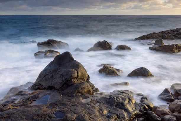 istock Magic sunrise at Punta de Silva with waves hitting the rocks. 1464855920