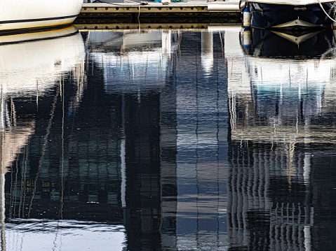 Reflection of boats on water