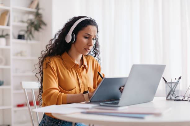 istock Lady Using Tablet And Laptop, Drawing With Stylus In Office 1464866983