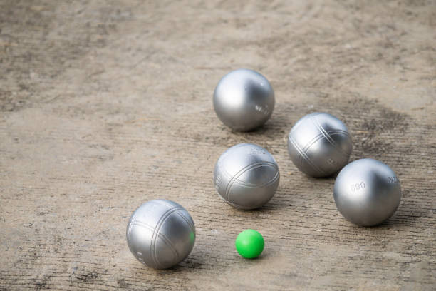 istock Petanque balls in the playing field with shady as a backdrop. 1464869592