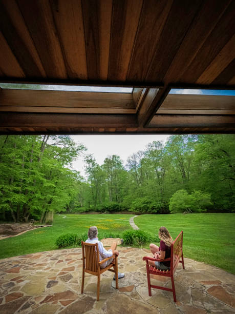 istock Father and daughter hanging out in the back yard 1464889953