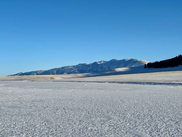 istock Snowy mountains and snowfields in winter 1464897412
