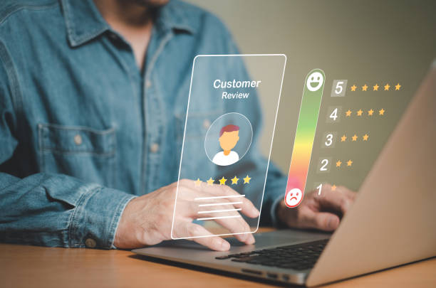 istock Selective focus at finger of business man while point finger to choose feedback on excellent customer service with five star score with smile. Service evaluation concept with futuristic icon. 1464902675