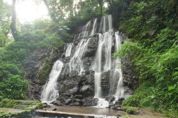 Coban Rondo, Princess and Talun Waterfall stock photo