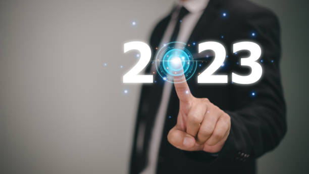 istock Business touching icon power on the 2023 virtual screen.ideas success and target and plan concept. 1464922564