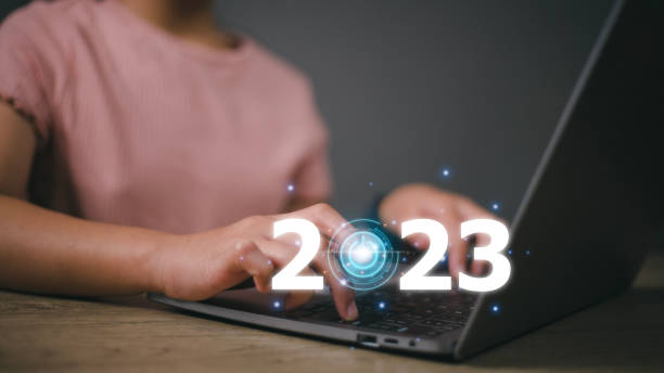 istock Business touching icon power on the 2023 virtual screen.ideas success and target and plan concept. 1464922608