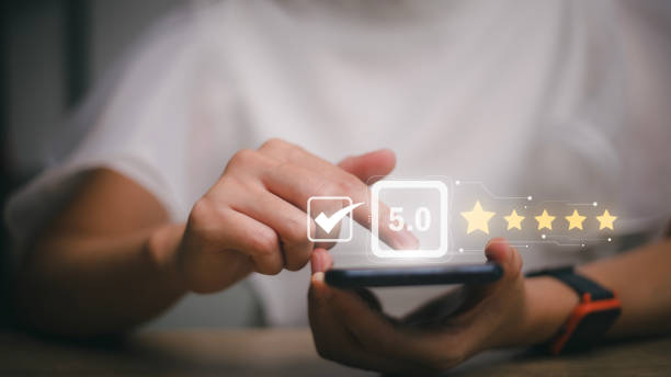 istock User give rating to service experience on online application, Customer review satisfaction feedback survey concept, Customer can evaluate quality of service leading to reputation ranking of business. 1464923202