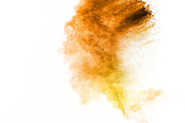 istock Orange yellow  powder explosion on white background. 1464926608