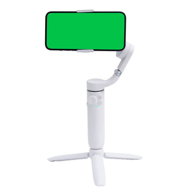 istock Electronic stabilizer for smartphone isolated on a white background. 3 axis gimbal stabilizer isolated. Gimbal close up  with isolated green screen with chroma key 1464933084