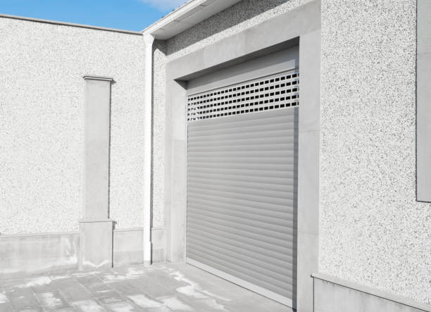 istock Roller shutter gate. Metal roller garage door as background. Automatic electric roll-up garage gate. Garage with rolling gates. 1464934568