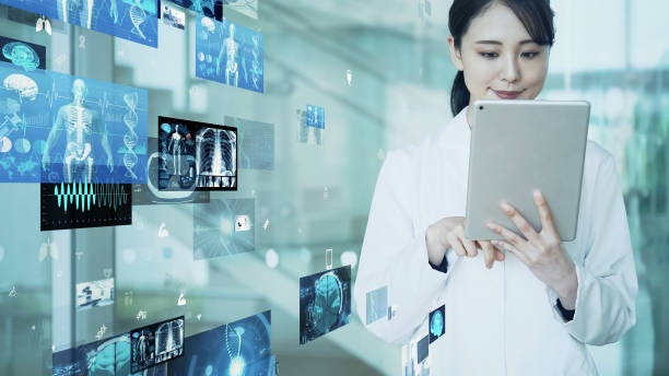 istock Young asian doctor watching hologram screens. Medical technology. Medtech. 1464939059