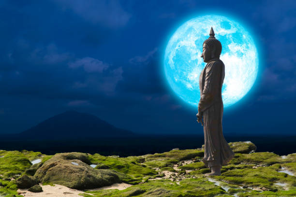 istock super blue moon and Buddha looking seven day style on the night sky 1464939171