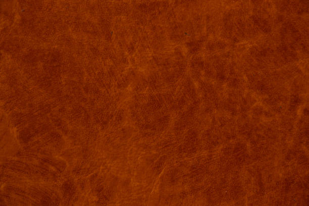 istock dark red genuine leather as a closeup background 1464941157