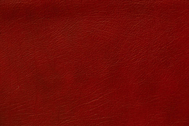 istock dark red genuine leather as a closeup background 1464941163