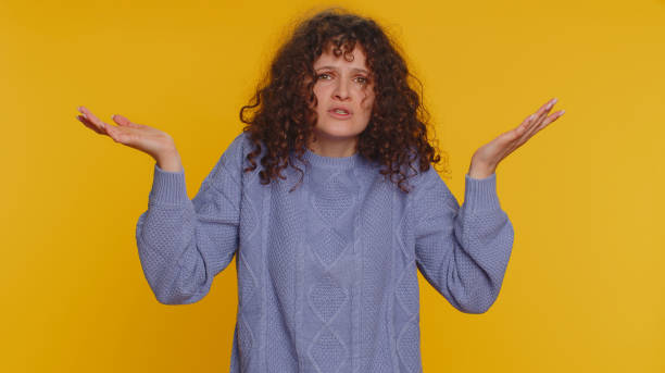 istock Woman raising hands in indignant expression ask why what reason of failure demonstrating disbelief 1464943723