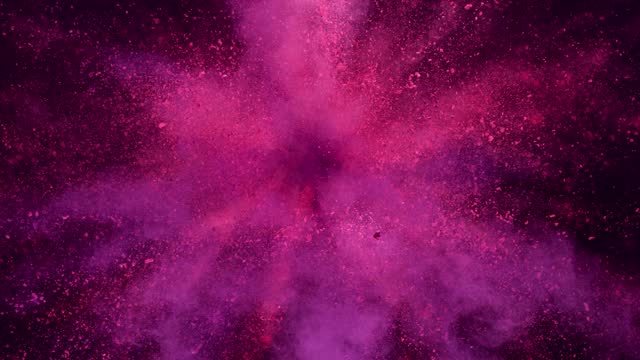 Super Slow Motion of Purple Powder Explosion Isolated on Black Background.