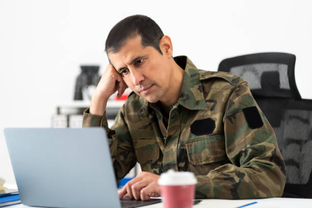 istock male soldier feeling tired at the office 1464947937