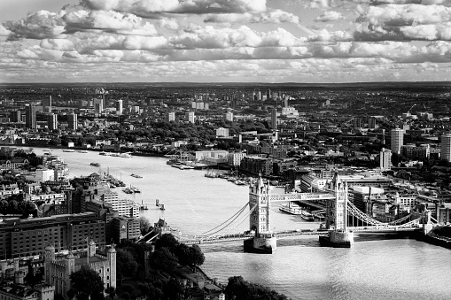 Aerial view of London skyline with St Paul Cathedral on a cloudy day.