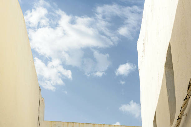 istock Low-angle shot of the cloudy blue sky on a sunny day 1464952872